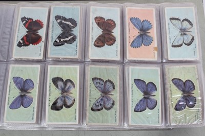 Lot 138 - Cigarette cards - A blue binder (No 5) containing sixteen sets of miscellaneous cigarette cards.