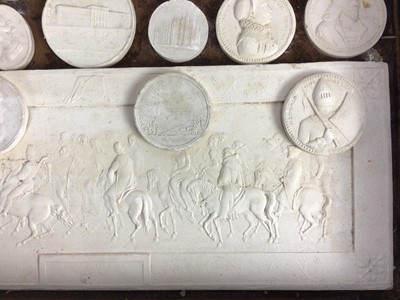 Lot 1544 - Collection of 19th century Italian grand tour plaster medallions, and large plaque, housed within a grained wooden case