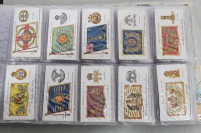 Lot 139 - Cigarette cards - A blue binder (No 6) containing eight complete sets of  cigarette cards.