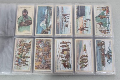 Lot 139 - Cigarette cards - A blue binder (No 6) containing eight complete sets of  cigarette cards.