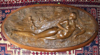 Lot 355 - Impressive late 19th/early 20th century composite relief panel, oval form, depicting Aphrodite and Cupid in a woodland clearing, mounted on oak frame, total size 138 x 70cm
