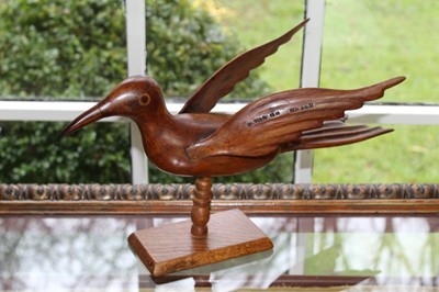 Lot 1567 - Pitcairn Island carved wooden bird figure, stamped Made by Christy Warren, Pitcairn Island, 42cm long