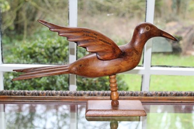 Lot 1567 - Pitcairn Island carved wooden bird figure, stamped Made by Christy Warren, Pitcairn Island, 42cm long