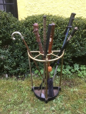 Lot 1578 - Victorian style demi-lune brass stick stand, together collection of antique and later sticks