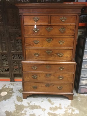 Lot 1674 - Mid 18th century red walnut chest on chest, the upper section with two short and three long drawers between quarter columns, the base with three long drawers, on bracket feet, 101cm wide x 54cm dee...