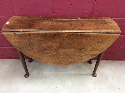 Lot 1691 - George II oak drop-leaf table with oval hinged top, on cabriole legs and pad feet, 110cm x 108cm