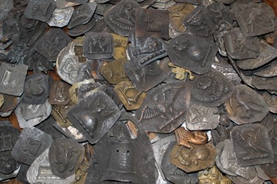 Lot 1722 - Good collection of 19th century embossed metal moulds, each modelled with heraldic crests, the largest approximately 6cm wide