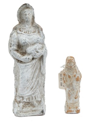 Lot 1741 - Antique white painted terracotta standing female figure, 23cm high, together with blue a similar smaller figure. (2)