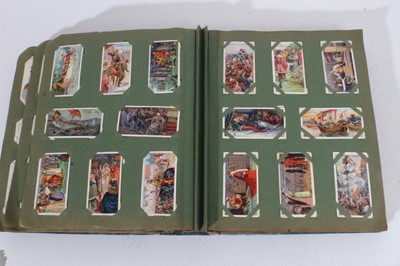 Lot 150 - Cigarette cards - An old slip-in type album containing a large selection of cigarette cards.