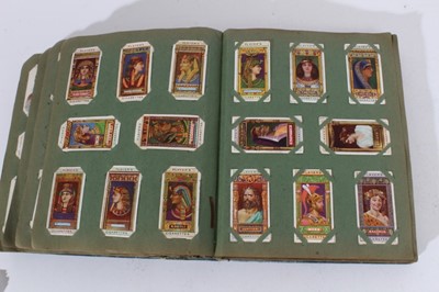 Lot 150 - Cigarette cards - An old slip-in type album containing a large selection of cigarette cards.