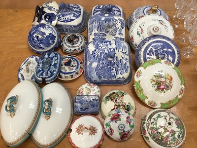 Lot 238 - Collection of twenty two 19th and later tureen lids including blue and white examples, ideal for wall mounting