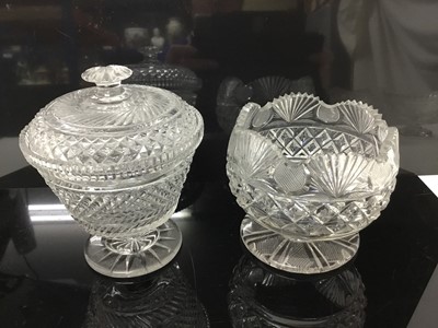 Lot 125 - Late 19th century cut glass jar bon bon jar and cover, together with another and a bowl