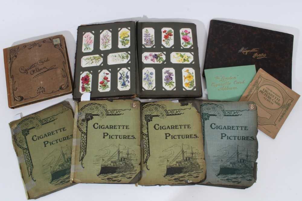 Lot 153 - Cigarette cards - Seven old albums, containing a selection of sets, part sets and odd cards.