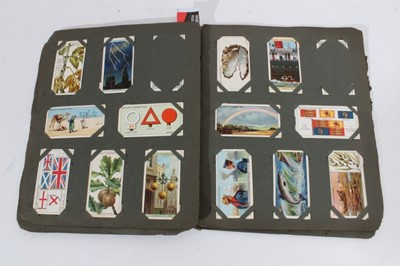 Lot 153 - Cigarette cards - Seven old albums, containing a selection of sets, part sets and odd cards.