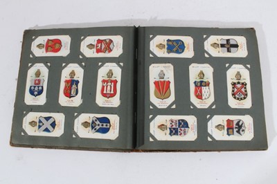 Lot 153 - Cigarette cards - Seven old albums, containing a selection of sets, part sets and odd cards.