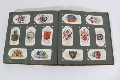 Lot 153 - Cigarette cards - Seven old albums, containing a selection of sets, part sets and odd cards.