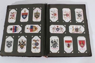Lot 153 - Cigarette cards - Seven old albums, containing a selection of sets, part sets and odd cards.
