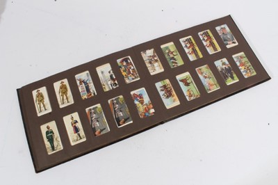 Lot 153 - Cigarette cards - Seven old albums, containing a selection of sets, part sets and odd cards.