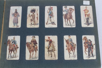Lot 154 - Cigarette cards - Red, Wills Album, containing a set of 101 Wills 1895 Soldiers of the World.