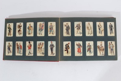 Lot 154 - Cigarette cards - Red, Wills Album, containing a set of 101 Wills 1895 Soldiers of the World.