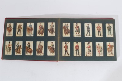 Lot 154 - Cigarette cards - Red, Wills Album, containing a set of 101 Wills 1895 Soldiers of the World.