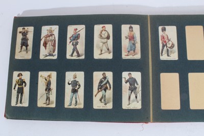 Lot 154 - Cigarette cards - Red, Wills Album, containing a set of 101 Wills 1895 Soldiers of the World.