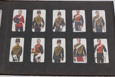 Lot 155 - Cigarette cards - Old Brown Album, containing a set of 50 Ogdens 1908 Soldiers of the World.