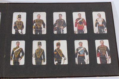 Lot 155 - Cigarette cards - Old Brown Album, containing a set of 50 Ogdens 1908 Soldiers of the World.