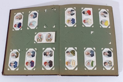 Lot 155 - Cigarette cards - Old Brown Album, containing a set of 50 Ogdens 1908 Soldiers of the World.