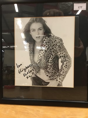 Lot 177 - Signed portrait photograph of Elizabeth Hurley signed ' love Elizabeth Hurley ' in glazed frame