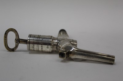 Lot 2388 - 19th century silver plated wine or brandy tap, by Farrow and Jackson, London and Paris, with removable key, stamped, Farrow & Jackson, proved to 200lbs. Numbered 98