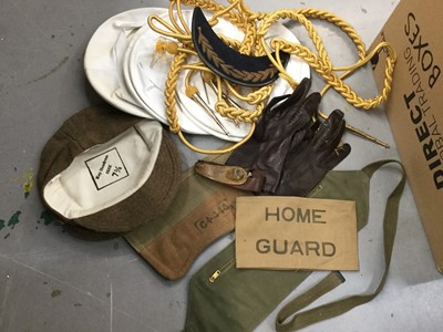 Lot 325 - Second World War Home Guard Arm Band (possibly a reproduction) together with a cap, canvas webbing, Naval caps and other military uniform pieces and sundries