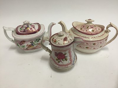 Lot 267 - Three 19th century pink lustre teapots and covers