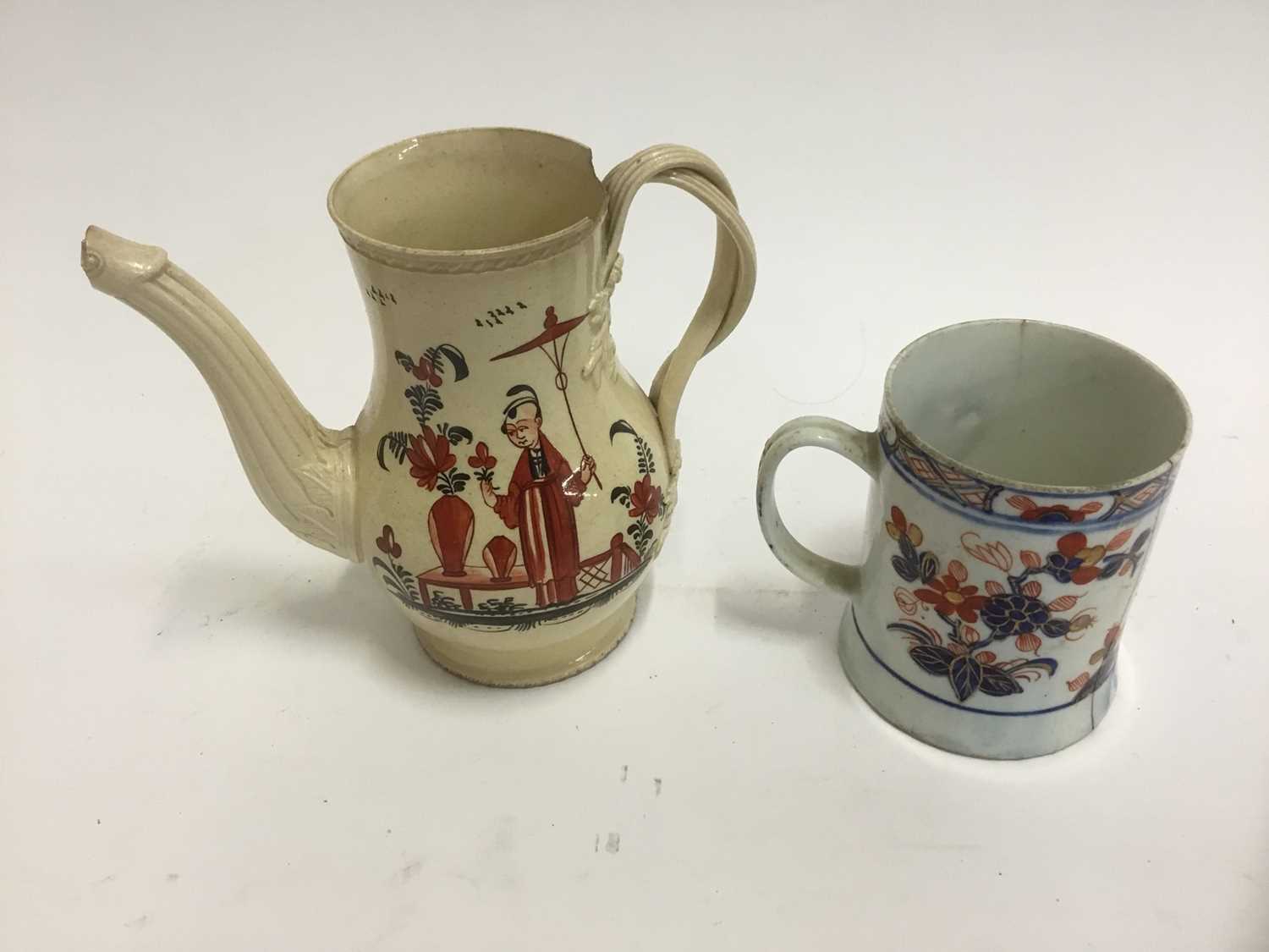 Lot 268 - 18th century creamware coffee pot, 18th century blue and white tankard