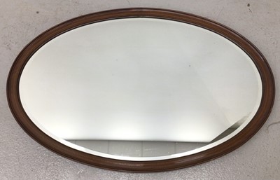 Lot 122 - Edwardian oval wall mirror and a walnut dressing mirror.