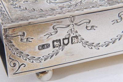 Lot 417 - Edwardian silver match box holder of rectangular form with engraved decoration and central Jasperware panel inset to the top, raised on four ball feet, (London 1905), maker E D, 16cm in length