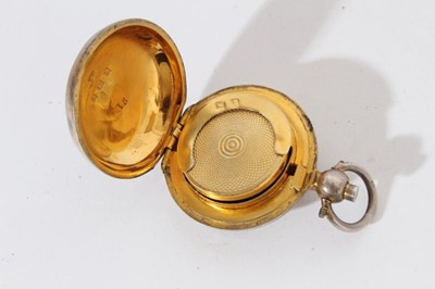 Lot 437 - Edwardian silver sovereign case of domed circular form with engraved decoration and gilded interior, (Birmingham 1907), together with a George V silver sovereign holder (Birmingham 1911)