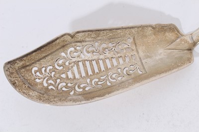 Lot 419 - George III silver fiddle pattern fish server with pierced and engraved decoration, (London 1815), maker William Bateman, together with another similar (London 1790), all at 11oz (2)