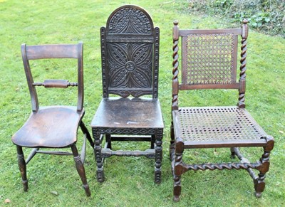 Lot 1759 - 17th century carved oak side chair with arched geometric panel back and solid seat, on carved and turned understructure, together a 19th century beech side chair with caned seat and back and a furt...