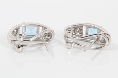 Lot 505 - Pair of contemporary diamond and blue topaz earrings in 9ct white gold setting with brushed and polished finish
