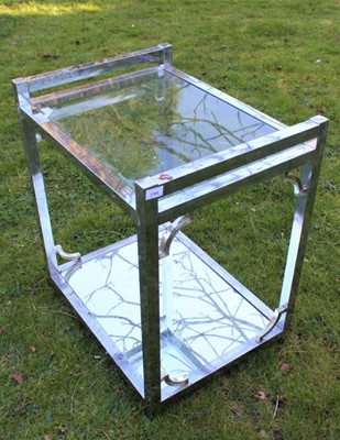 Lot 1780 - Stylish Deco-style chromium two tier side table with glass top and mirrored base, between square section supports, 66cm wide x 50cm deep x 74cm high