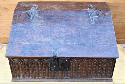 Lot 1788 - 17th century oak Bible box with hinged sloping fall enclosing interior with shelf and lunette carved frieze, 56cm wide x 40cm deep x 30cm high