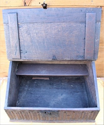 Lot 1788 - 17th century oak Bible box with hinged sloping fall enclosing interior with shelf and lunette carved frieze, 56cm wide x 40cm deep x 30cm high