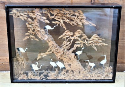 Lot 1794 - Early 20th century Japanese carved cork panoramic scene depicting storks amongst a tree, in glazed and ebonised box frame, 37cm x 50cm