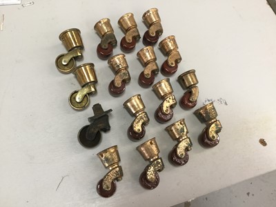 Lot 293 - Group of sixteen Victorian brass and ceramic furniture castors