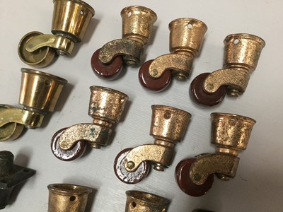 Lot 293 - Group of sixteen Victorian brass and ceramic furniture castors