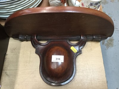 Lot 316 - Victorian mahogany wall bracket together with a pair of similar wall brackets (3)