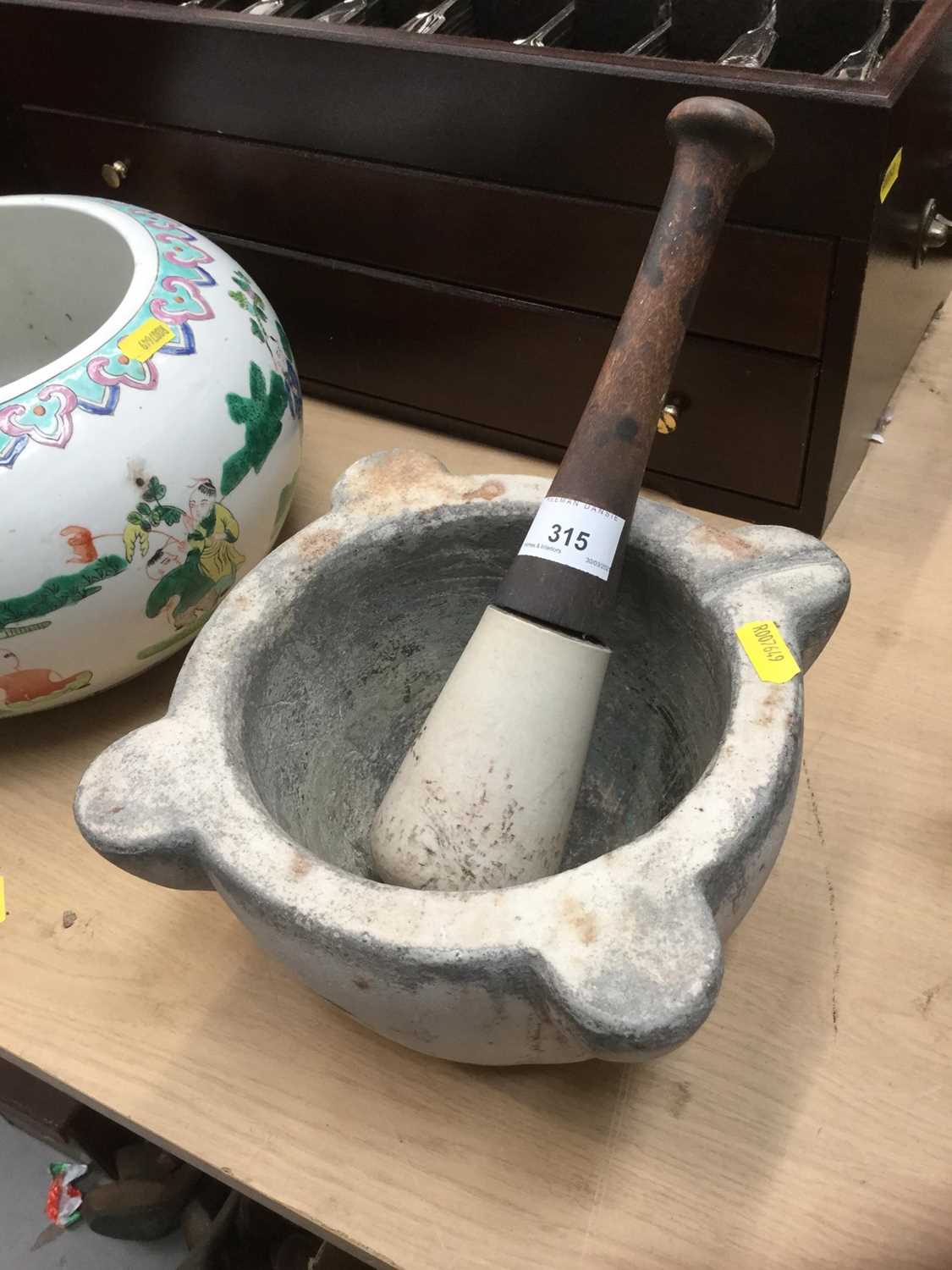 Lot 314 - Antique pestle and mortar