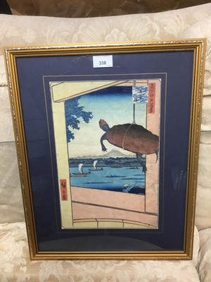 Lot 338 - After Hiroshige, woodcut print - turtle suspended before a window, 34 x 23cm, glazed frame