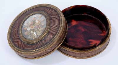 Lot 783 - 18th century tortoiseshell and brass circular box